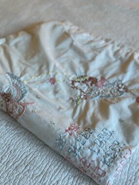 Vintage embroidered baby quilt